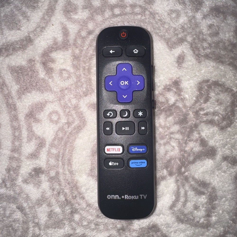 On Running Roku TV Remote - Black and Purple